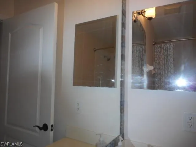 Full bathroom featuring vanity and a shower