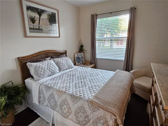 Bedroom with a textured wall