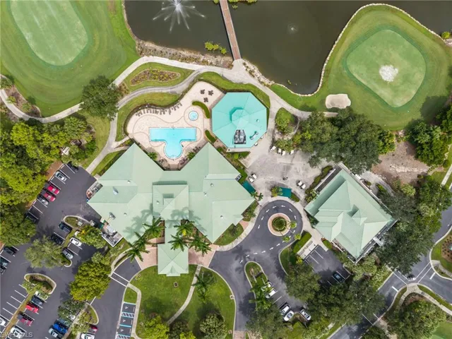 Aerial view of a local golf course and a nearby body of water