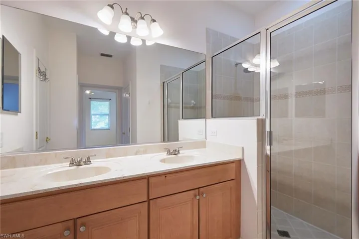 Master bathroom with dual sinks