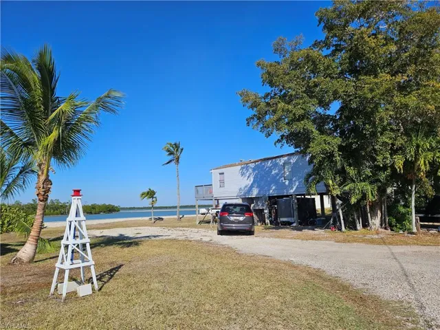 Harbor Place vacant lot & side of 238