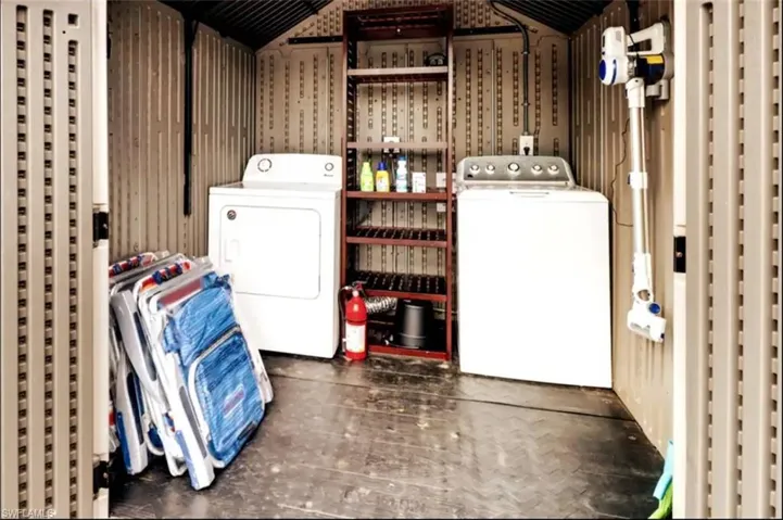 Clothes washing area with washing machine and dryer