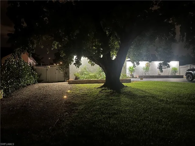 View of yard at twilight