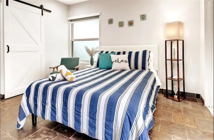 Bedroom with a barn door