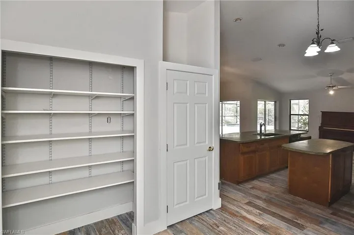 Pantry featuring sink