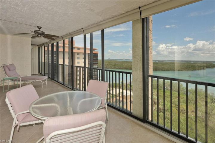 Wide wrap around balcony with floor to ceiing sliders/screens!