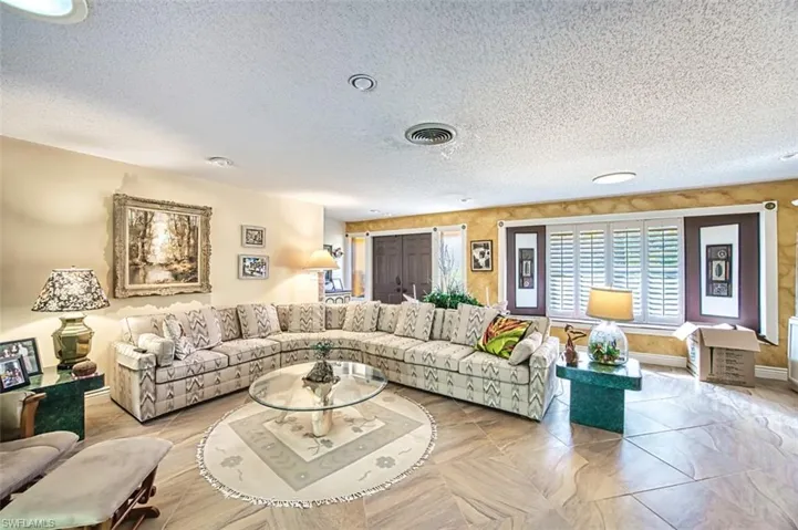 Living room with a textured ceiling