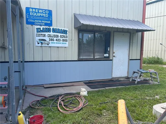 Entry door to office space. Also accessible from within bay.