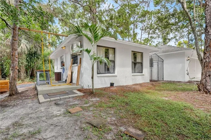 View of front of home featuring stucco siding