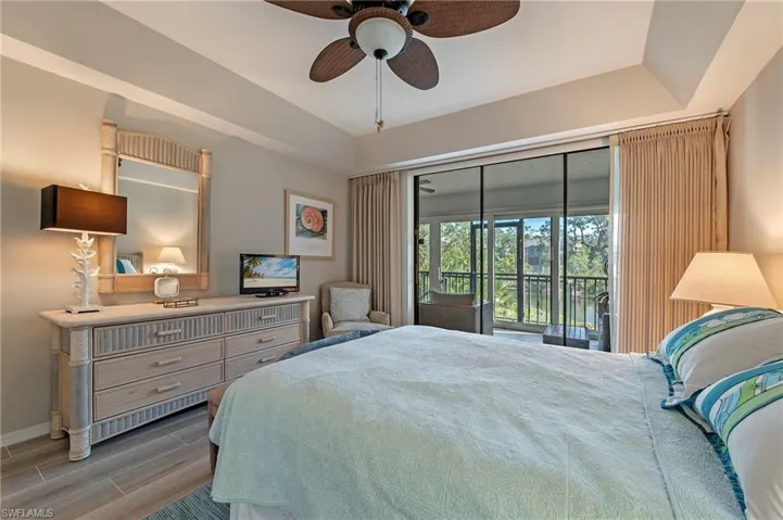 Primary bedroom with lanai access.
