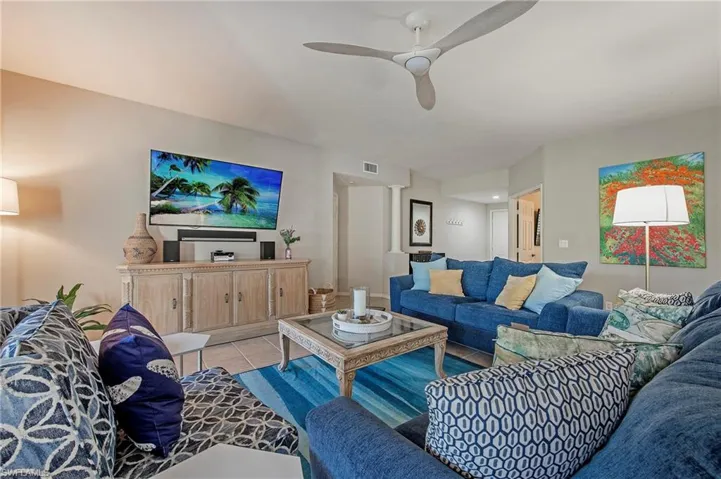 Large living space with tile flooring - so many possibilities.