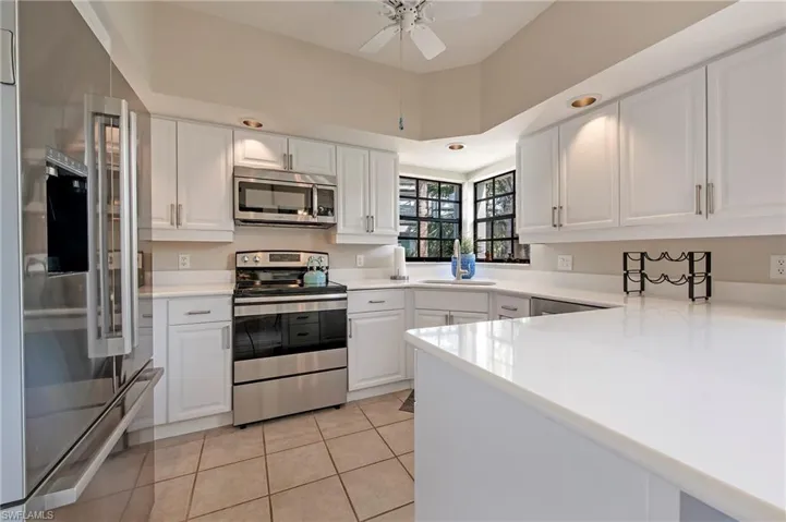 Updated kitchen with newer appliances, ample counter and cabinet space.