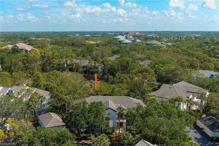 This first-floor carriage home in Oakwood Lake of Bonita Bay is waiting for your arrival!