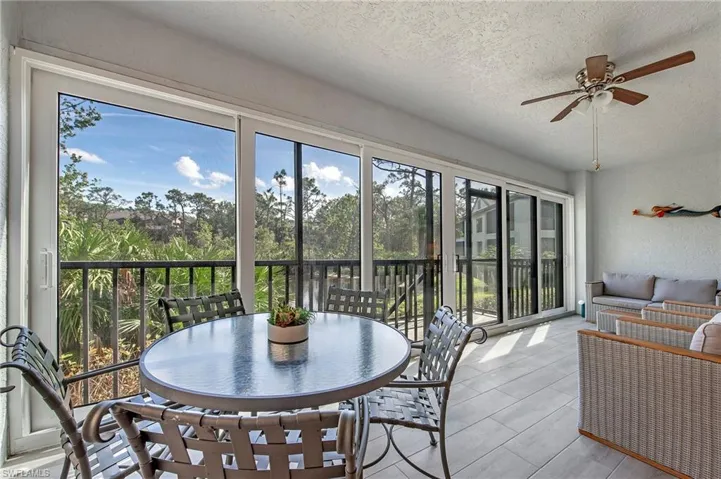 Enclosed lanai with sliding doors and access to rear preserve area.