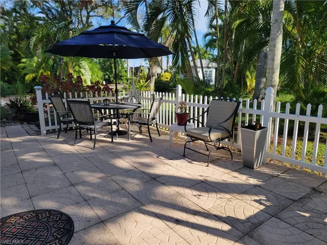 View of patio / terrace with outdoor dining space and fence