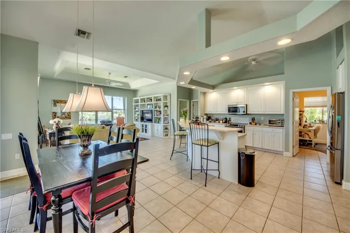 Breakfast nook is between the lanai and the kitchen. Bedroom 3 is through the open doorway on the right.
