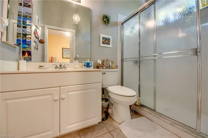 Bathroom 3 has tiled step-in shower. All 3 bedrooms have their own bathroom.