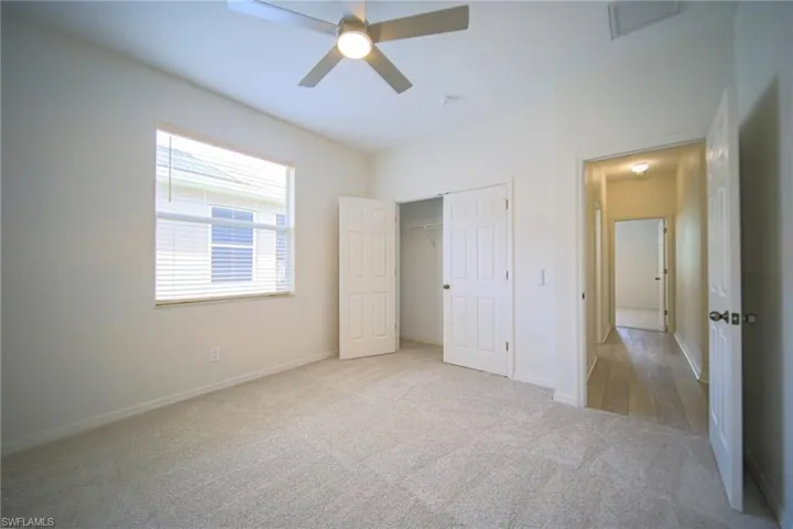 Bedroom 2 Has New Carpeting, New Ceiling Fan/Light, And A Large Walk-In Closet!