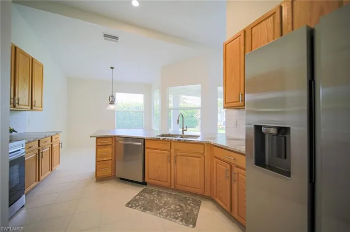 This Kitchen Is Equipped With New Stainless Steel Appliances, Brand New Textured (Brushed) Granite Countertops, New Sink And Fixtures, New Lighting, And An Oversized Walk-In Pantry!