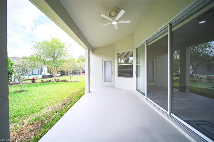 Very Large Covered Lanai With Triple Slider Leading Out From Living Room And Private Entrance From The Master Bedroom!