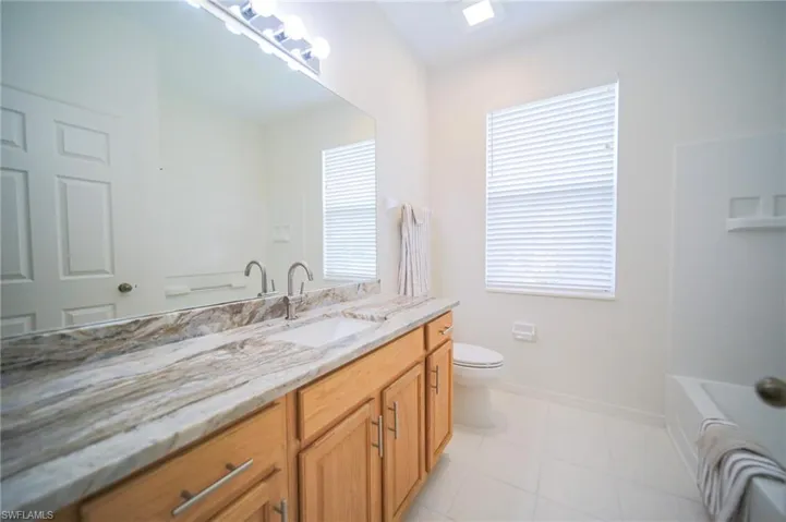 The Spare Bathroom Has New Granite Countertops, New Fixtures, And New Toilet!