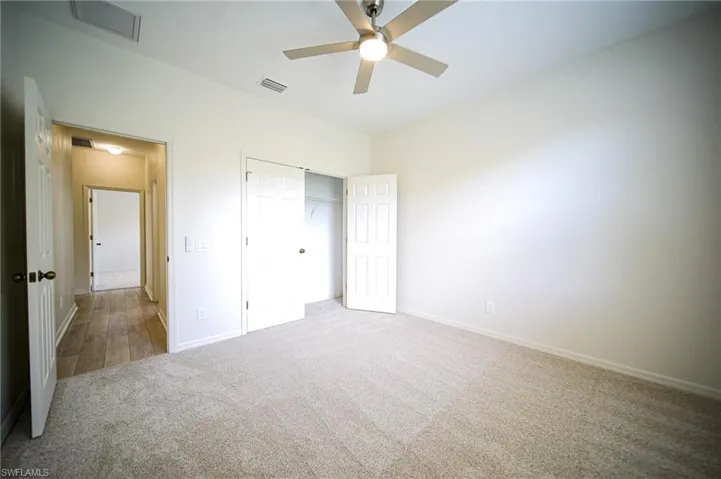 Bedroom #3 Has New Carpet, Ceiling Fan/Light, And A Large Walk-In Closet!