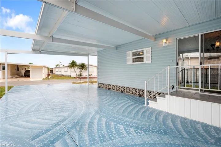 View of patio with an attached carport