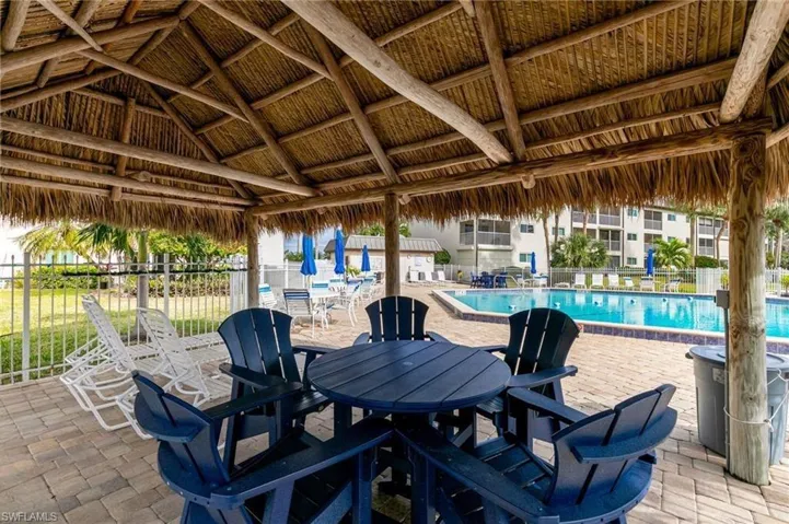 View of patio / terrace with a gazebo and a community pool