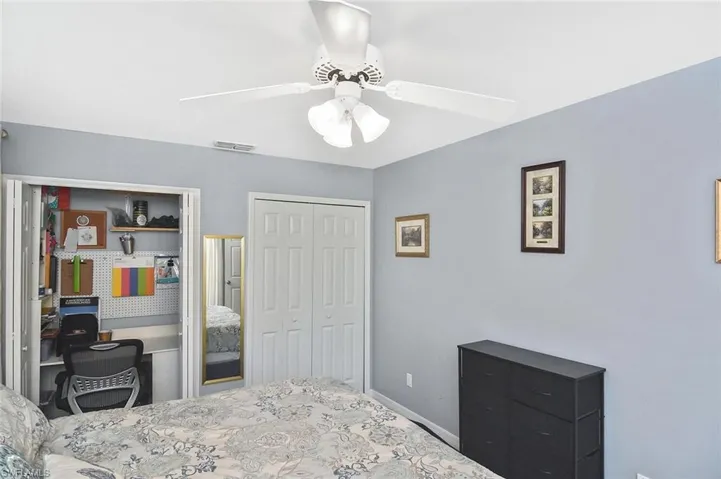Bedroom featuring a ceiling fan