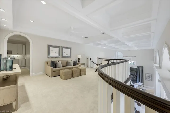 Spacious and inviting living area on the second floor; your guests will enjoy this private space where they can relax and unwind.