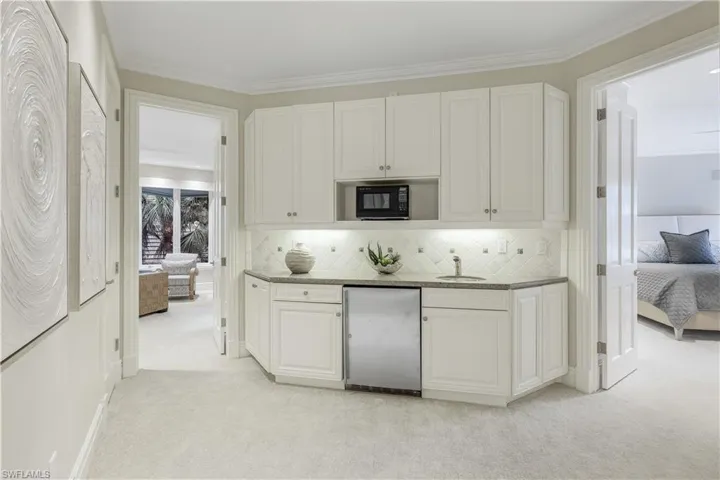 Guests will enjoy access to this "kitchenette," located near all three upstairs guest bedrooms.
