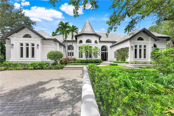 Welcome home to this stately residence, privately tucked away alongside the Imperial River. EASY GULF ACCESS!!