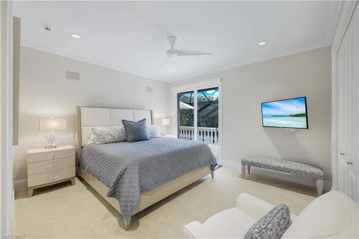 Beautifully styled guest bedroom with ample space and tons of bright Florida sunshine!