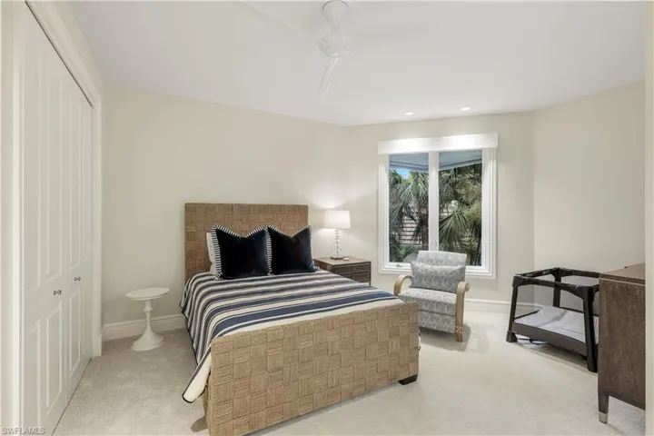 Cozy and modern second floor guest bedroom.