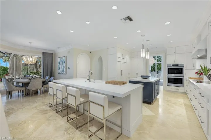 The door just to the right of the dining space opens for wine storage! There is nothing missing here.