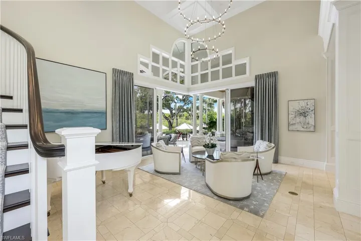 The sitting area is ideal for conversation and relaxation, accented by elegant furnishings and soft neutral tones.