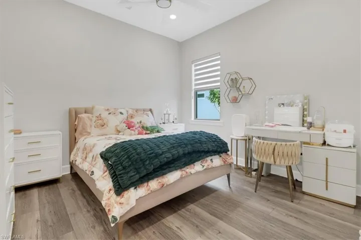 Bedroom featuring luxury vinyl flooring