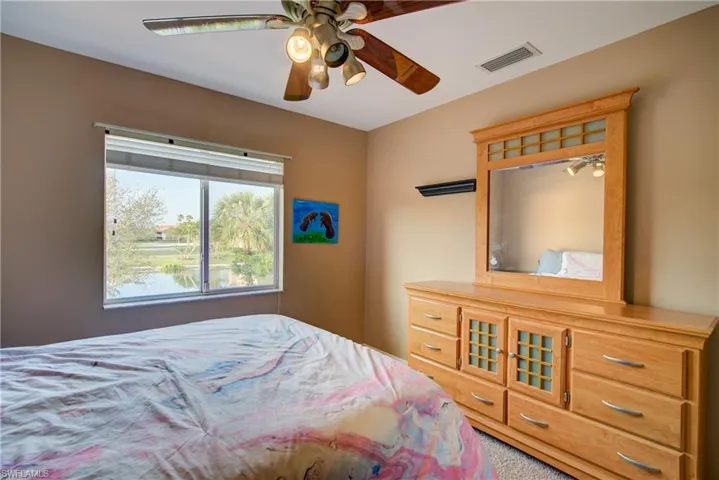 A good sized bedroom with large windows