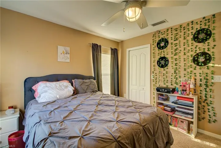 A good sized bedroom with large windows & 6' x 4' walk-in closet