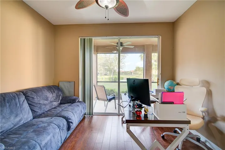 This bedroom/office has direct access to the outside space