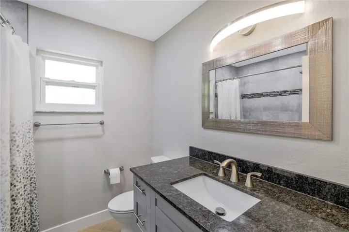 Guest Bathroom with tub/shower combination.