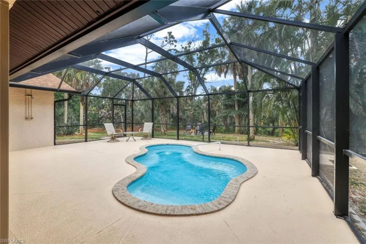 Enjoying cooling in the pool with seating.  The pool is  approximately 5 years old.