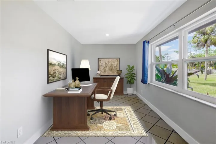 Virtually staged den with lots of natural light