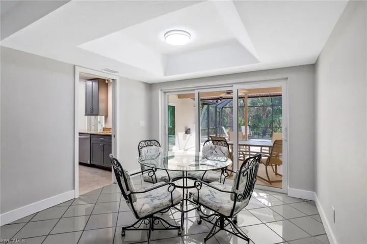 Dining Room has easy access to the lanai with the impact slider.