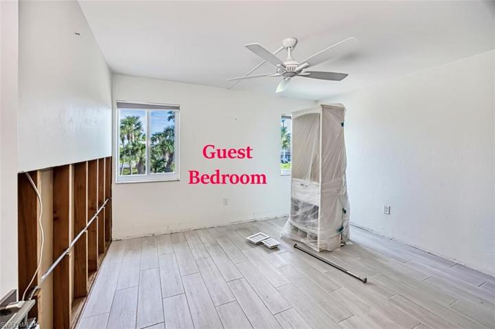 Guest bedroom and closet drawer bank with shelves