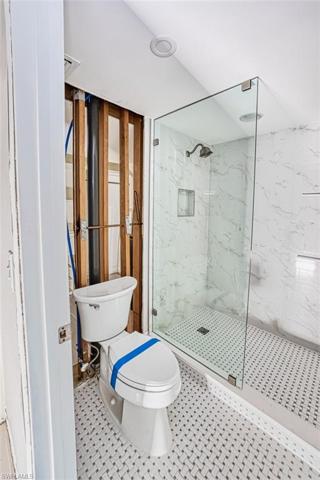 Porcelain shower tile and basket weave porcelain floor tile from 2019 Designer Remodel