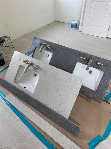 Quartz bathroom counter tops (double sink is for Master, single is for guest bath