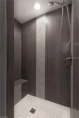 Primary Bathroom with a shower stall