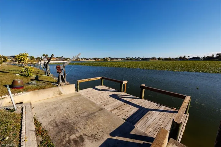 Dock featuring a water view