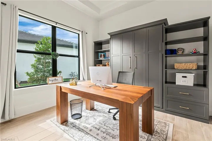 Den, office, playroom, media room with French doors and Murphy Bed